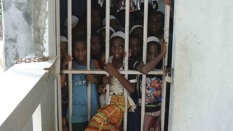 Papuan boys at the Daarur Rasul Islamic boarding school, outside Jakarta, behind locked gates 