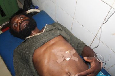 Gayus Auwe was shot on his abdomen and left thigh