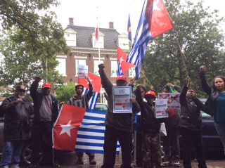 Free West Papua Campaign NL protests outside the Indonesian Embassy in Den Haag, Netherlands in support of the boycott