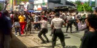 Indonesian police shooting West Papua during the fundraising event 