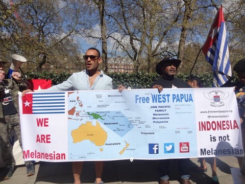 Former PNG Rugby League Captain Paul Aiton holds a banner with West Papuan independence leader Benny Wenda, acknowledging West Papua as part of the Pacific family