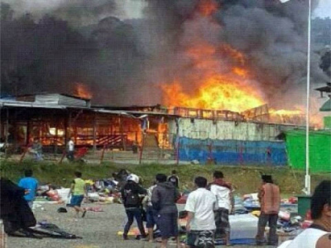 Stalls in flames in Karubuga, 17 July