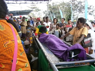 The family members of Julian Okoare and Emmanuel Mairimau grieving after they were shot dead by the Indonesian military today 