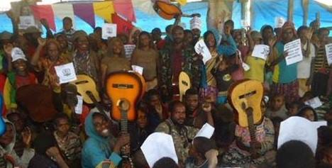 West Papuans in Paniai guitars music is a weapon