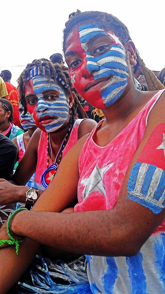 West Papuan youths taking selfies in Port Numbay/Jayapura at a mass rally calling for Wets Papua's full membership of the Melanesian Spearhead Group (MSG). June 2016.