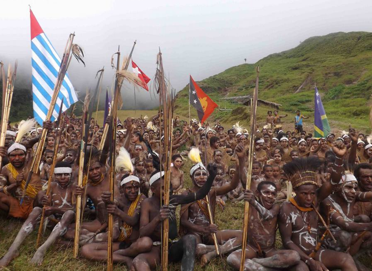 West Papuan people in the Star Mountains region on the border with Papua New Guinea raise Melanesian flags and call to come back to the Melanesian family as a full member of the Melanesian Spearhead Group (MSG).