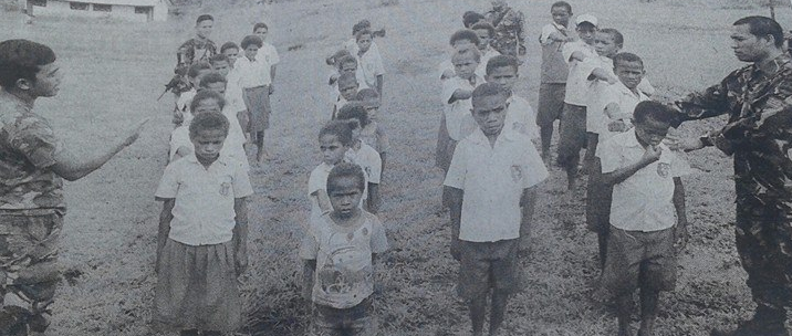 Indonesian military taking the place of teachers and lining West Papuan children up in their Primary School