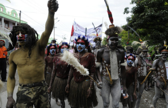 Proudly Melanesian not Indonesian. West Papuan people rally in the streets of the Highlands town of Wamena to call for freedom from Indonesian colonialism. 